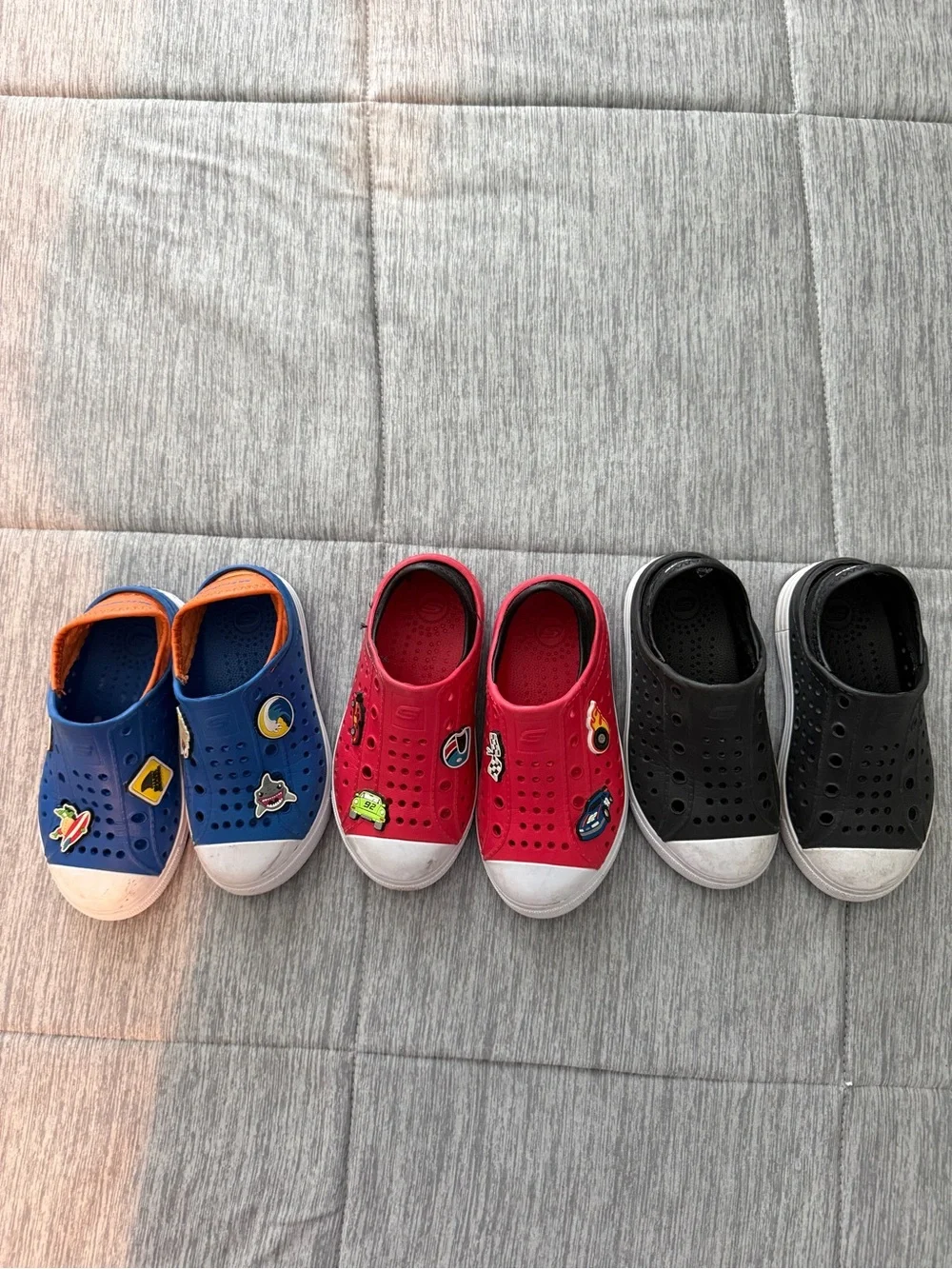 Sketchers Slip-On Kids Shoes in Blue, Red, and Black